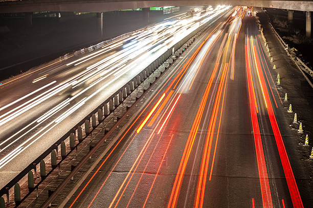 istock Busy Night Traffic Motion Blur 506668429