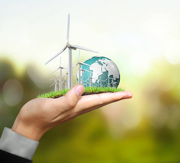 istock wind turbines in the hand 506669462