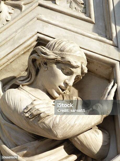 Irreverent Angel On The Facade Of The Cathedral Of Florence Stock Photo - Download Image Now