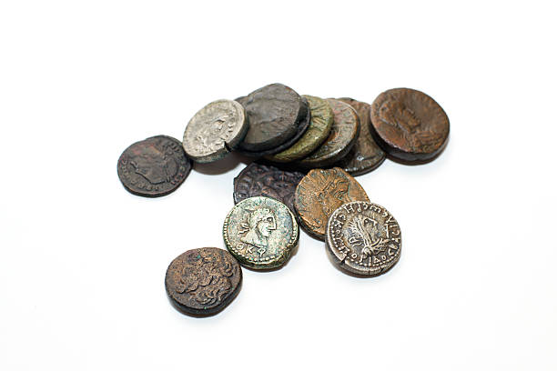 istock Vintage coins with portraits on a white background 506669900