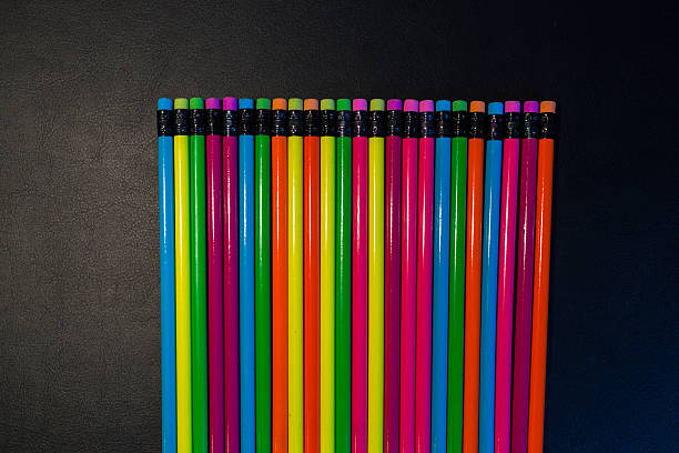 istock Colour pencils isolated on black background 506671980
