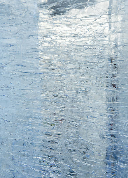 istock Glacial transparent block of ice with patterns. 506673694