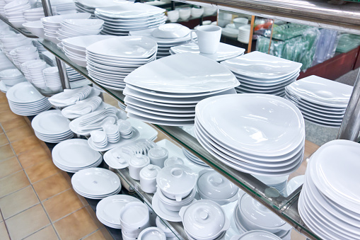 Traditional Chinese restaurant tableware: cups and plates.