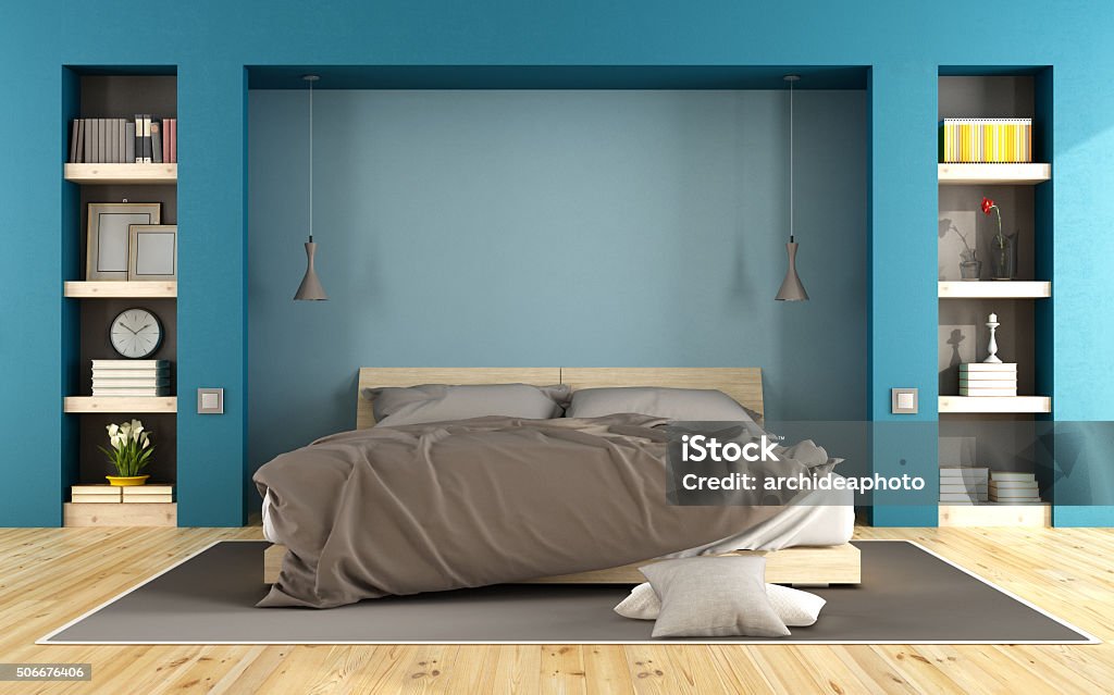 Blue modern bedroom Blue modern bedroom with wooden bed and niche with books - 3D Rendering Apartment Stock Photo