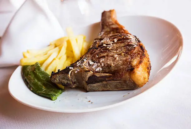 Photo of Roasted entrecÃ´te served with potato on plate