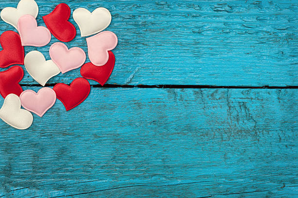 istock Red hearts on the blue boards 506678240