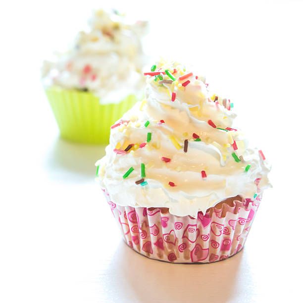istock Sweet cupcakes on a white background 506678604