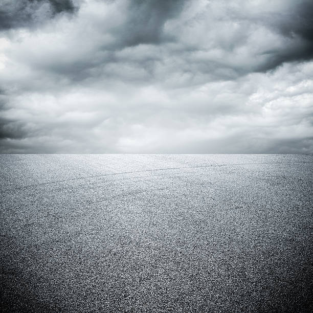 istock close-up horizontal view of new asphalt road 506690077