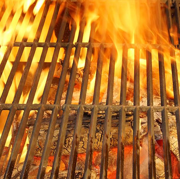 istock Hot BBQ Grill, Bright Flames and Burning Coals. 506690093