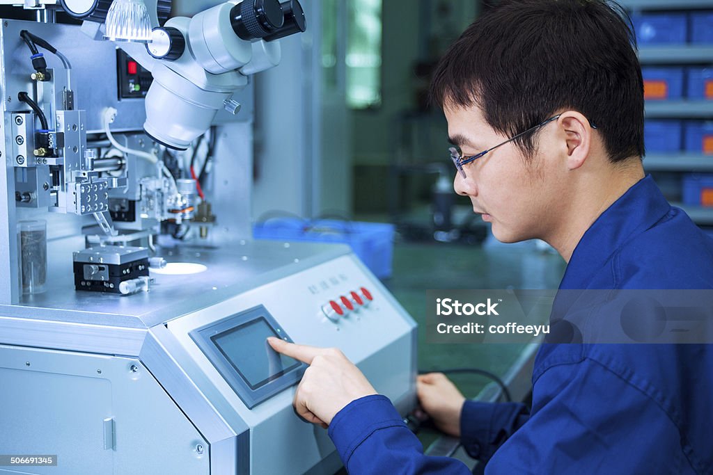 Engineer working in the laboratory Device Screen Stock Photo