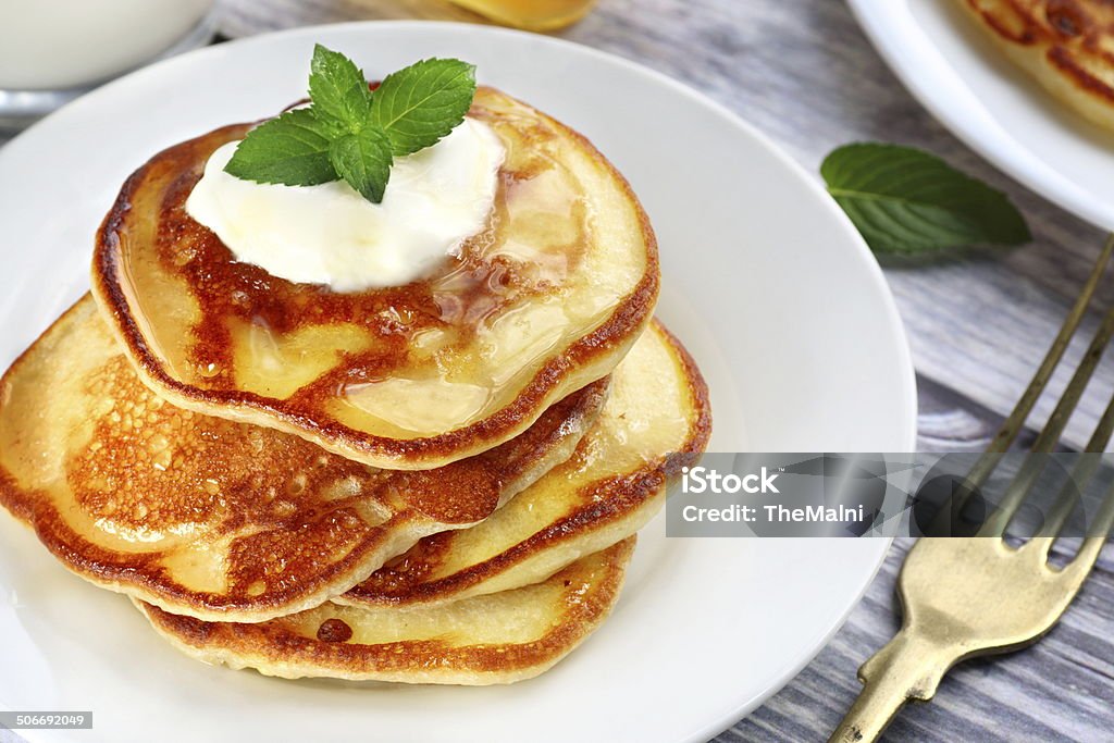 American style pancakes Close up of plate with a pile of home made pancakes American Culture Stock Photo