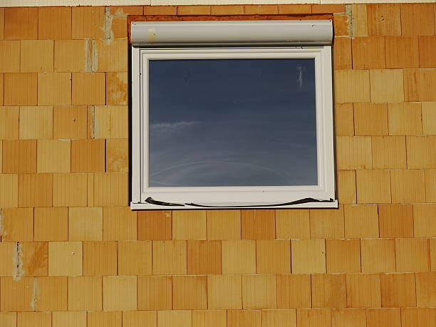 istock building site house window brick wall glass 506692137