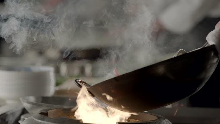 Flaming stir fry, slow motion