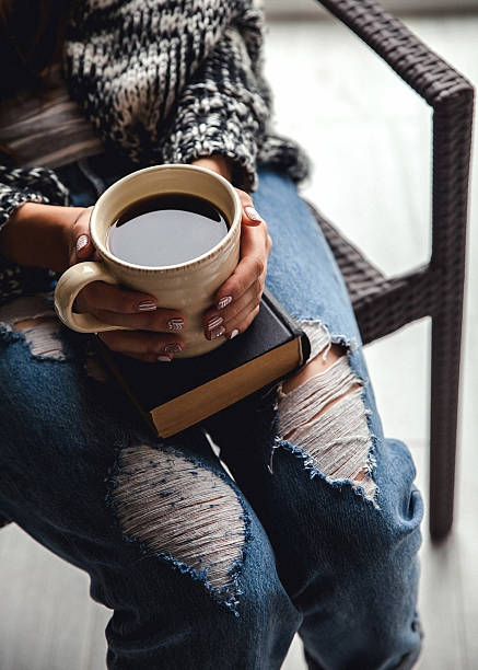 istock girl having break with cup of fresh coffee 506699044