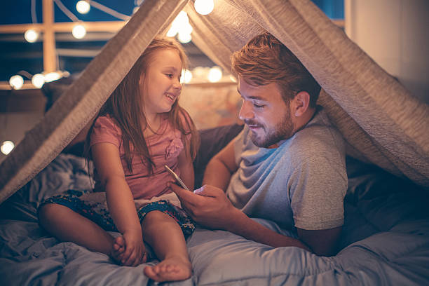 istock Father and daughter enjoying at home. 506699148