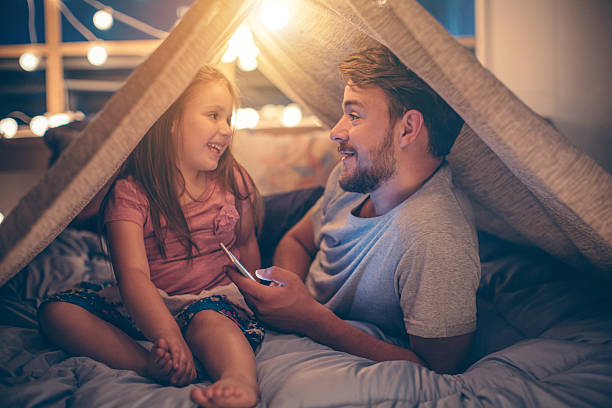 istock Father and daughter enjoying at home. 506699458