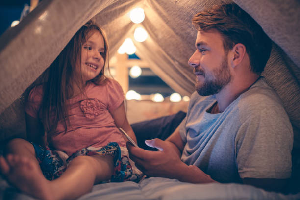 istock Father and daughter enjoying at home. 506700022