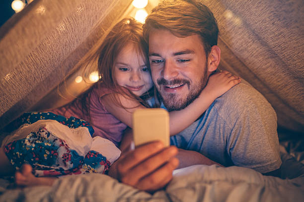 Father and daughter enjoying at home.