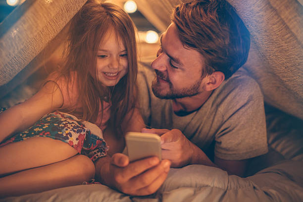 istock Father and daughter enjoying at home. 506700914