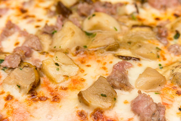 istock Pizza with porcini and sausage 506700938