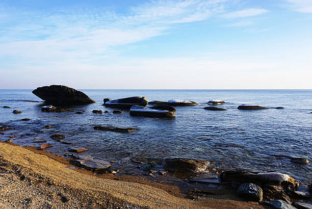 istock rocks in the sea 506700984