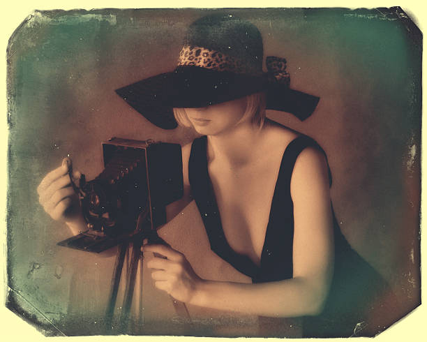 Girl with a camera on old photos