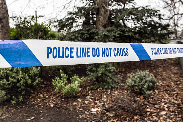 istock Police Tape Evidence 506703160