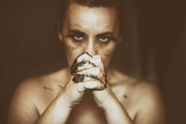 istock Desperate woman holding hands in prayer 506703472