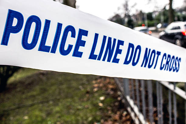 istock Police Tape Evidence 506704580