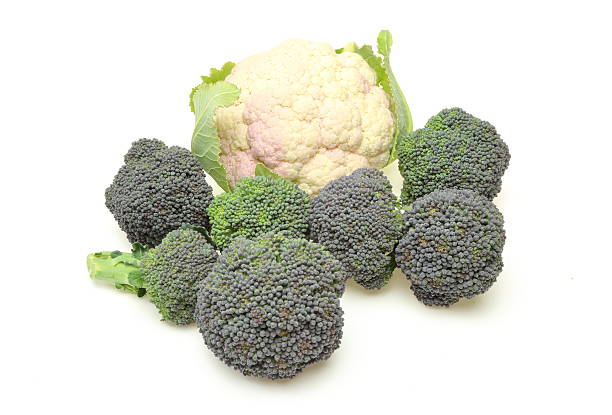 istock Cauliflower and Broccoli in a white background 506705246