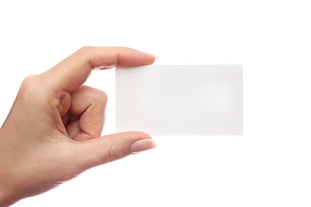 istock Female hand holds business card on white background 506705572