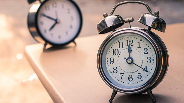 istock Vintage style with old alarm clock 506707584
