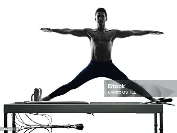 Man Pilates Reformer Exercises Fitness Isolated Stock Photo - Download Image Now - Pilates, In Silhouette, Men