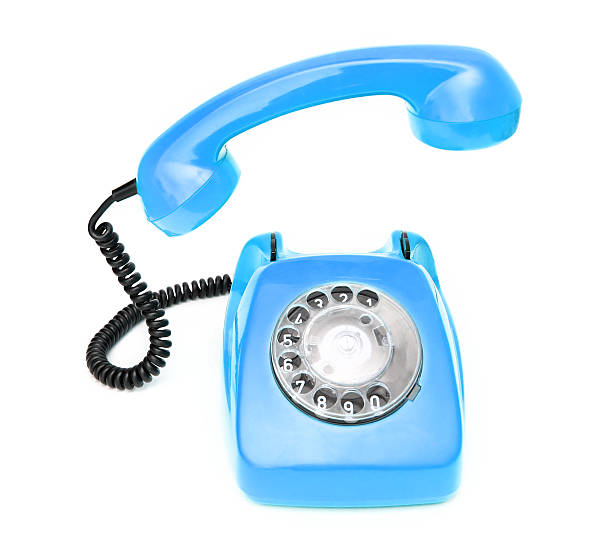 istock Blue retro telephone isolated on white background. 506712874