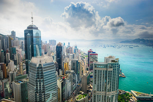 Hong Kong China City Skyline Hong Kong, China aerial view of the cityscape at Victoria Harbor. victoria harbour stock pictures, royalty-free photos & images