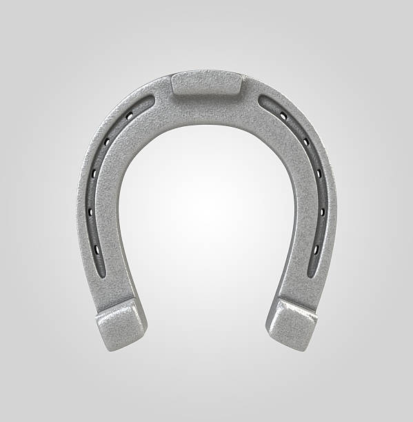 istock silver horseshoe, 3d metallic object isolated on white background 506713539