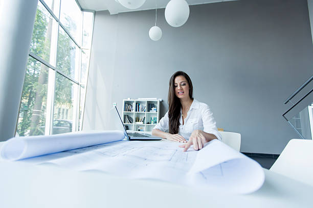 istock Young woman in the office 506714811