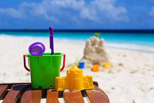 istock kids toys on tropical beach 506715217