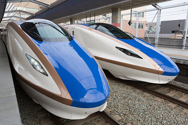 Nagano, Japan - June 2, 2014 : Two E7 series Shinkansen bullet trains arrived at JR Nagano Station in Nagano, Japan. The Hokuriku Shinkansen Line will be extended to Kanazawa on the Sea of Japan in spring 2015.