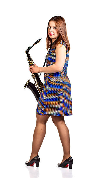 istock woman with saxophone isolated on white 506724059