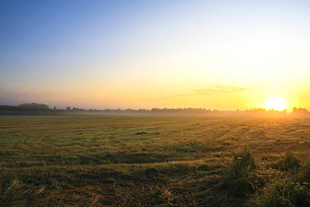 istock autumn landscape with sunrise 506724263