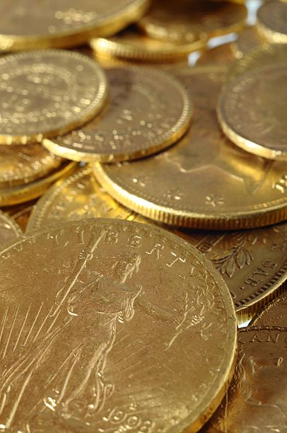 istock Lot of Gold coins for saving 506724491