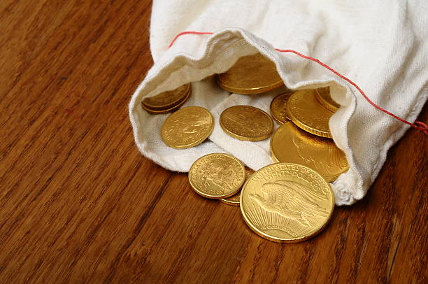 istock Lot of Gold coins for saving 506724511