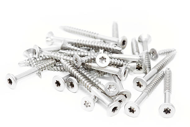 istock Screws on white background, shallow DOF 506726349