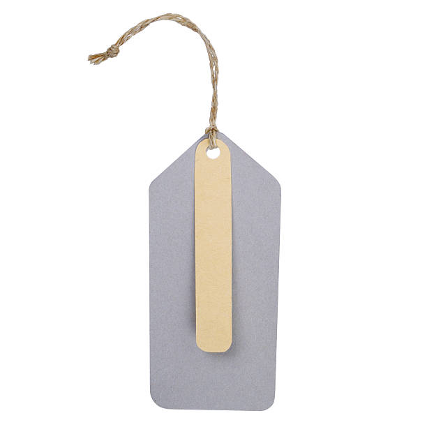 istock cardboard tag with ribbon isolated on white background 506729761