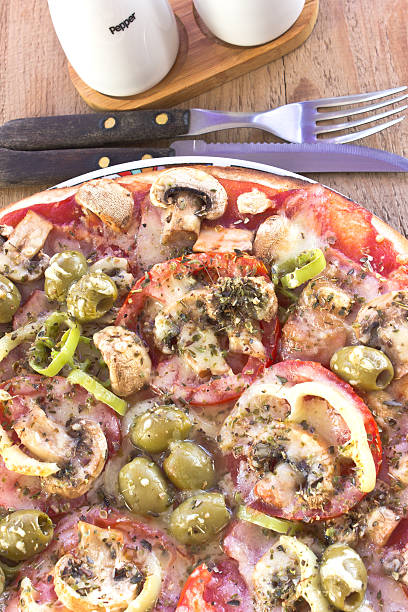 istock Delicious italian pizzas served on wooden table 506730139