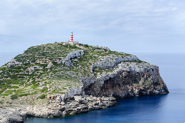 istock Cabrera island. Old lighthouse on the rock cape. 506730471