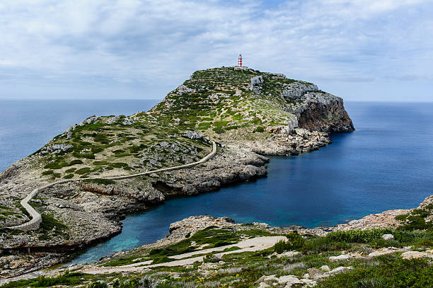 istock Cabrera island. Old lighthouse on the rock cape. 506731551