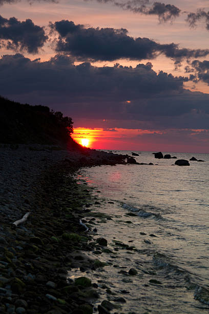 istock sunset at sea. 506731615