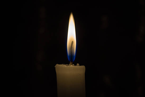istock Light a candle in the dark 506750250